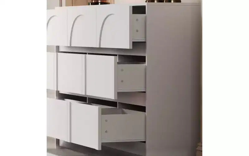 Commode-buffet de rangement blanche à 9 tiroirs, poignées dissimulées et motif en arc